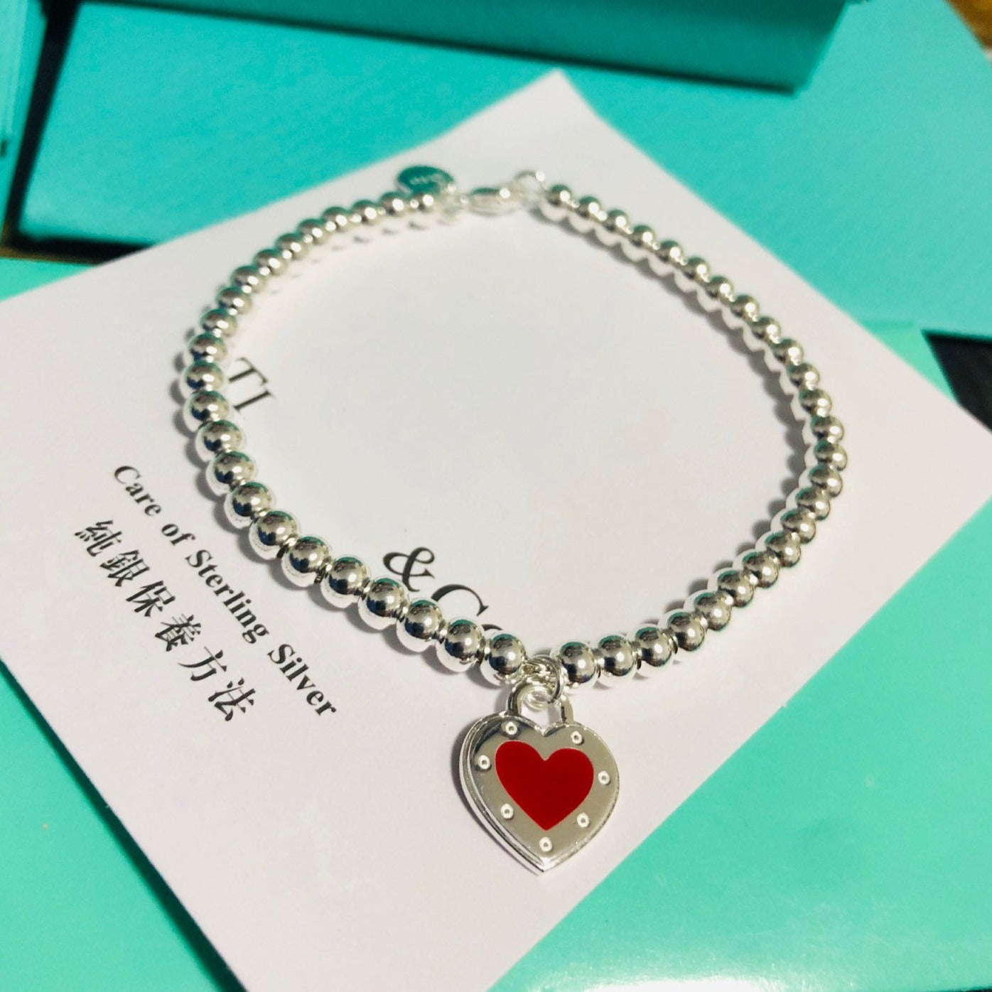 TIFFANY LOVE TIFFANY RED HEART TAG BEAD BRACELET