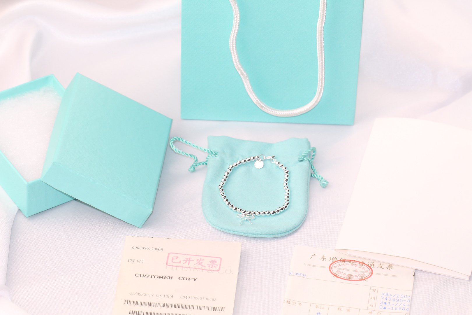 TIFFANY STERLING SILVER BOW BEAD BRACELET