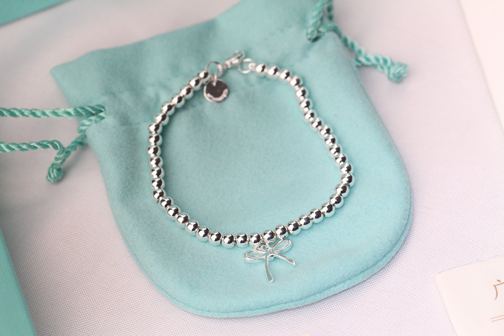 TIFFANY STERLING SILVER BOW BEAD BRACELET